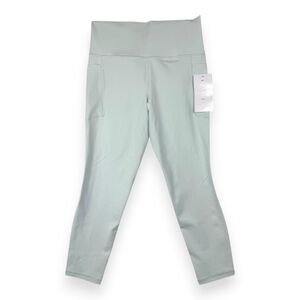 NWT Athleta Salutation Stash 7/8 Tight M Light Sage Green High Rise Leggings